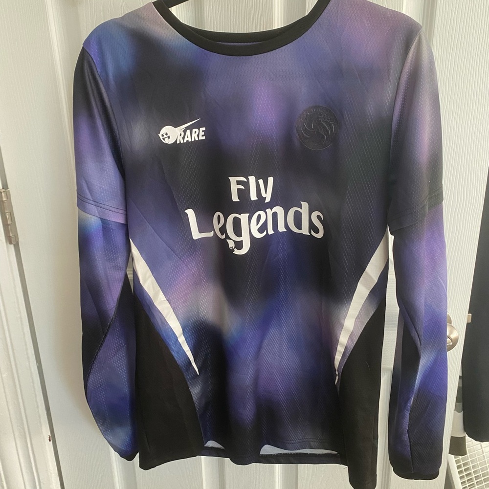 Pink dolphin soccer jersey. Size medium